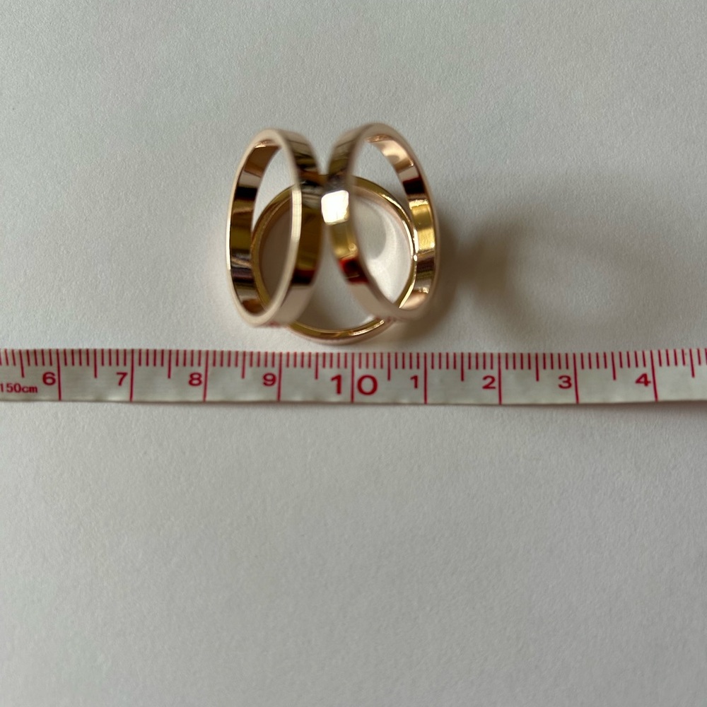 Rose gold tone interlocking scarf ring model sculptural design - Picture 5 of 5